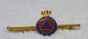 Sujeta-corbata P. Civil